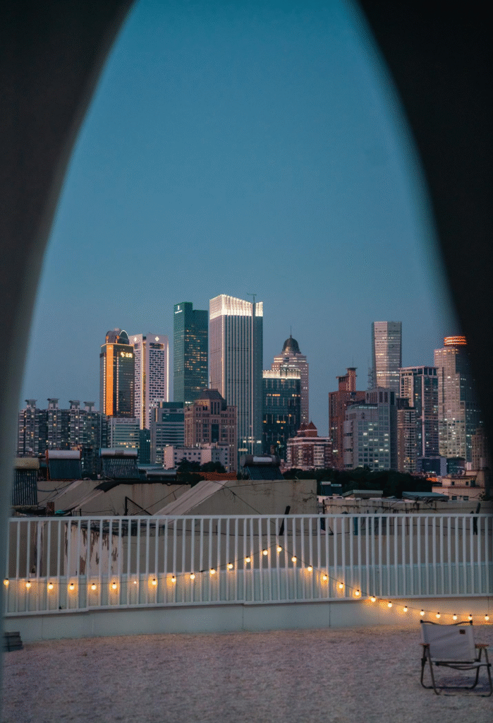 Evening Balcony with City View & Warm Lighting